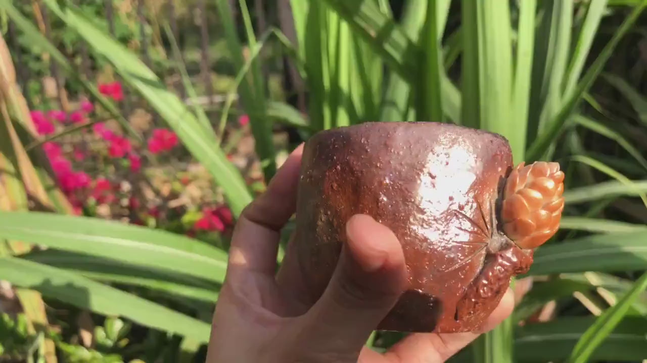 This is a woodfired pottery teacup