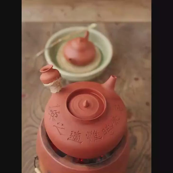 This is a pottery kettle