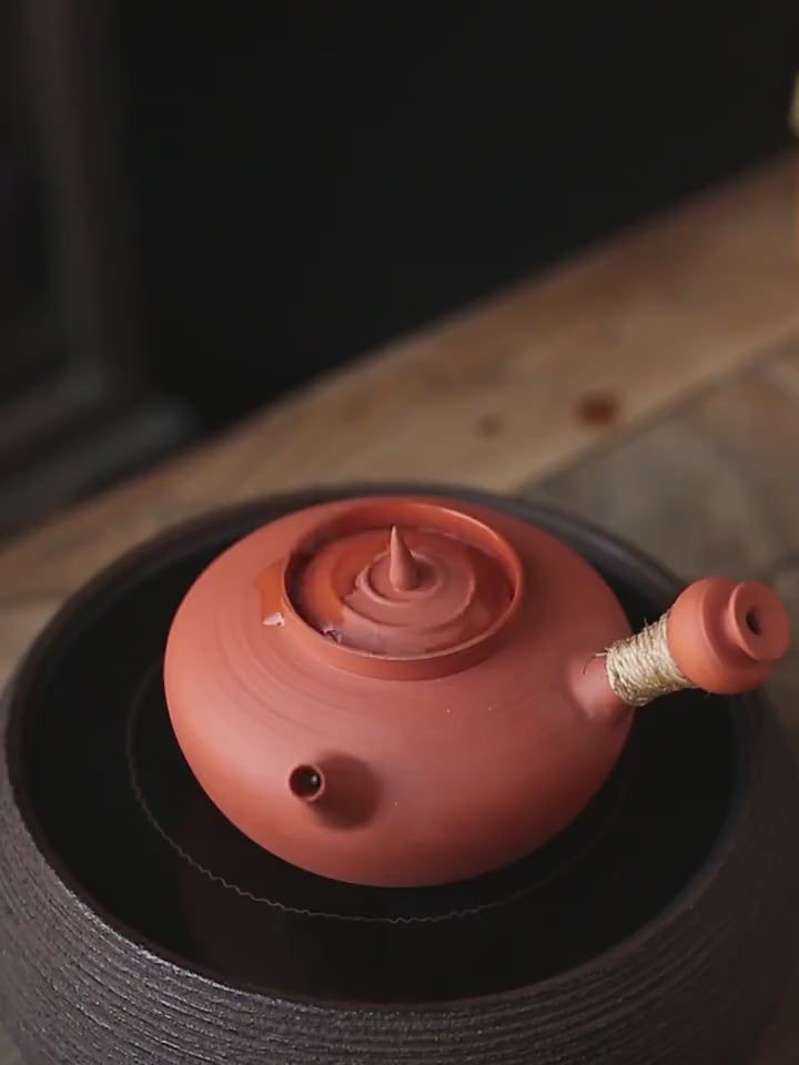 This is a pottery kettle