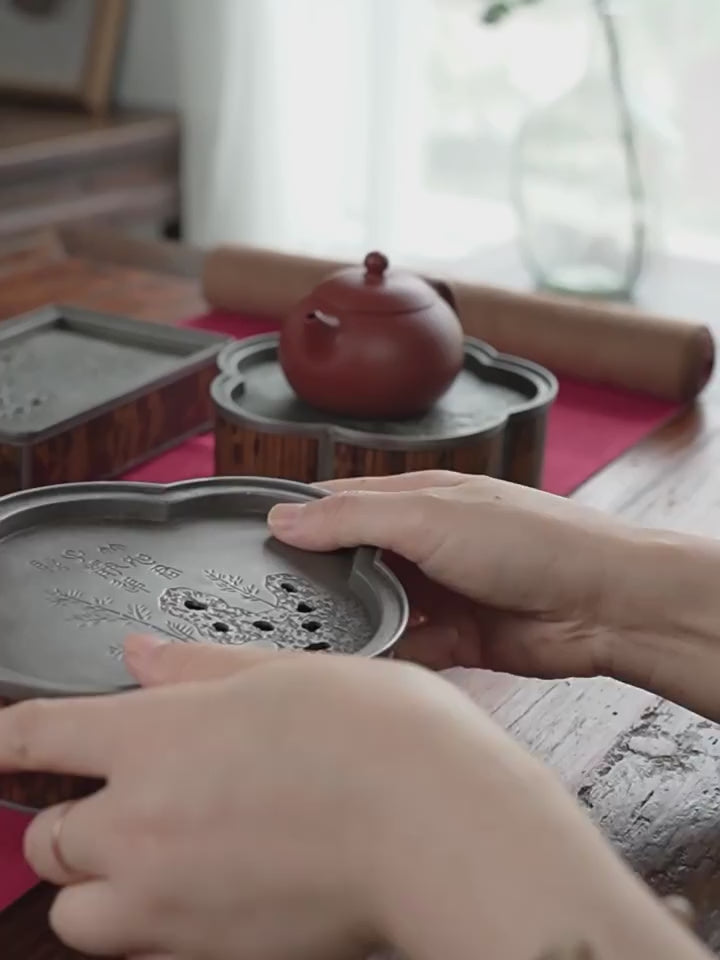 this is a tin tea tray tea boat