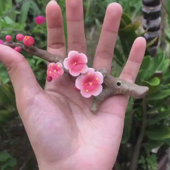 This is a ceramic flower incense holder