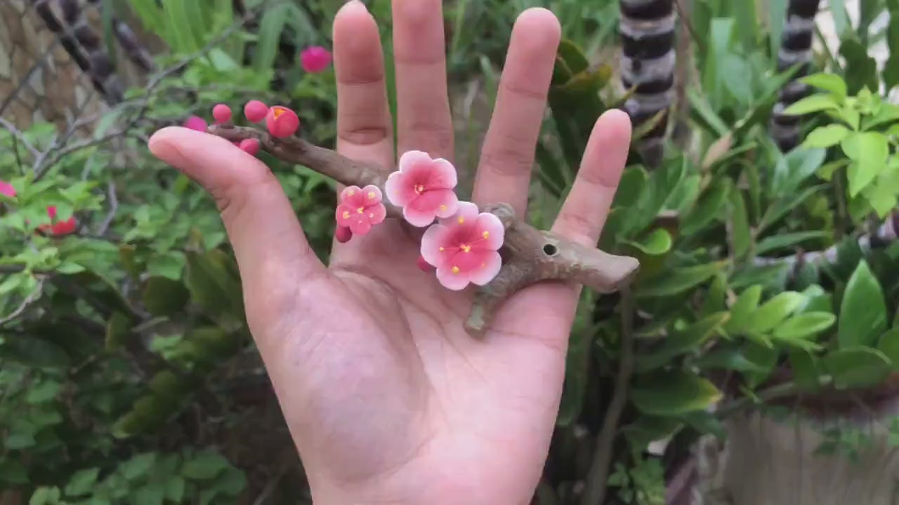 This is a ceramic flower incense holder