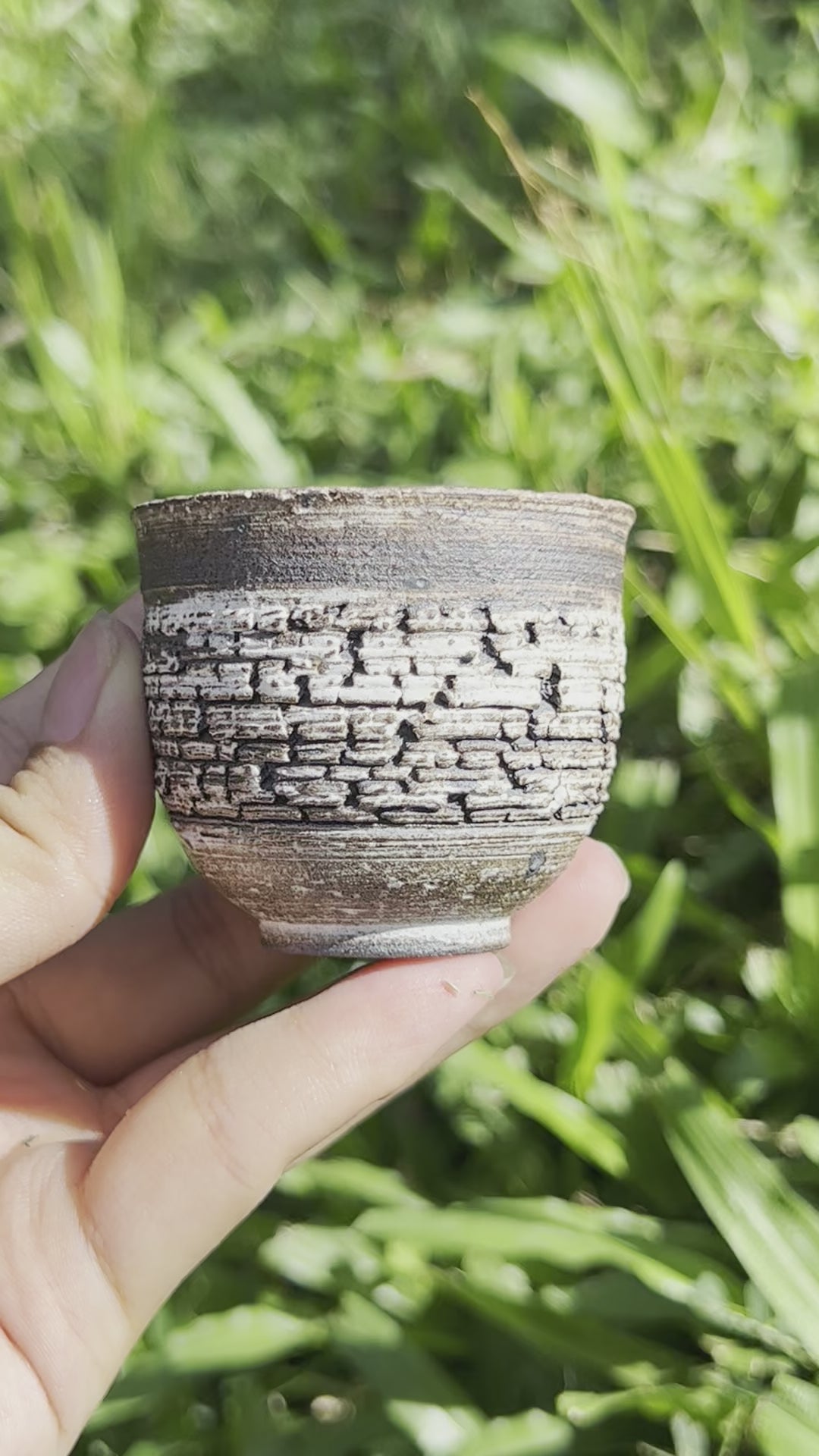 This is a pottery teacup