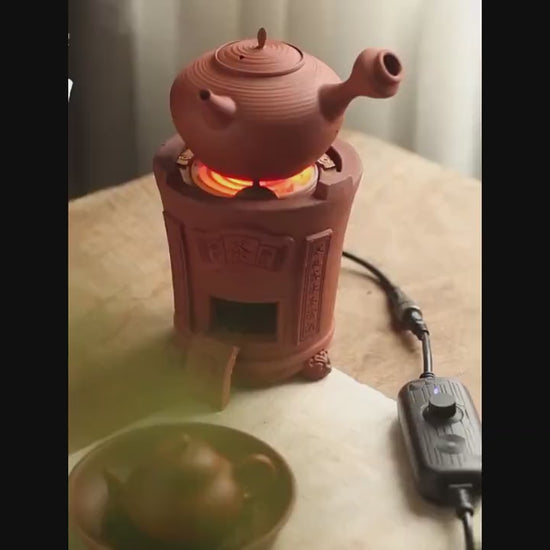 This is a pottery electric This is an electric charcoal stove. this is a chaozhou clay pottery stove 