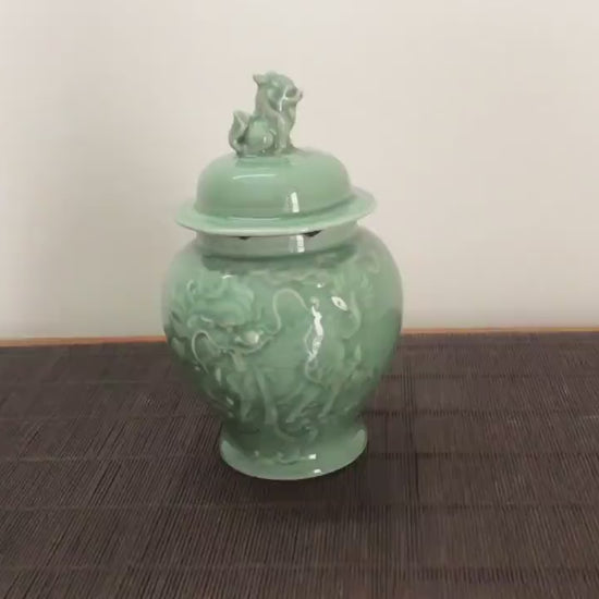 this is a celadon tea jar.this is a green ceramic tea storage canister