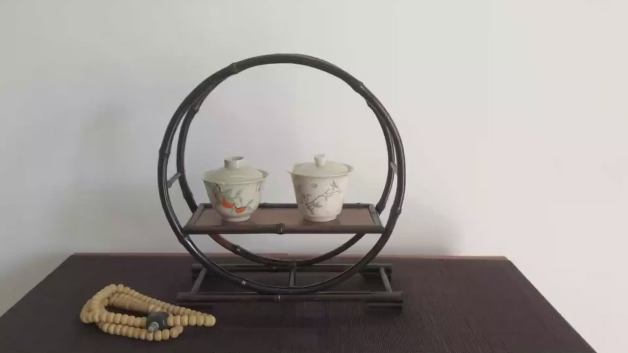 This is a purple bamboo shelf bamboo rack.this is a bamboo teaware storage shelf