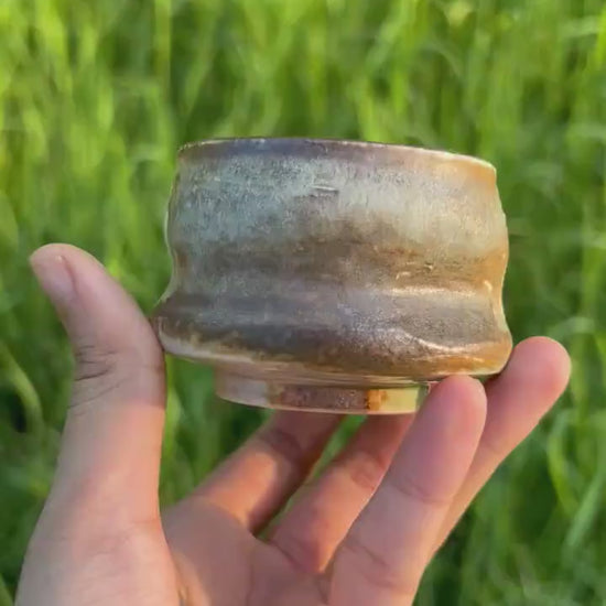 This is a shino ware teacup. this is a shinoyaki pottery teacup