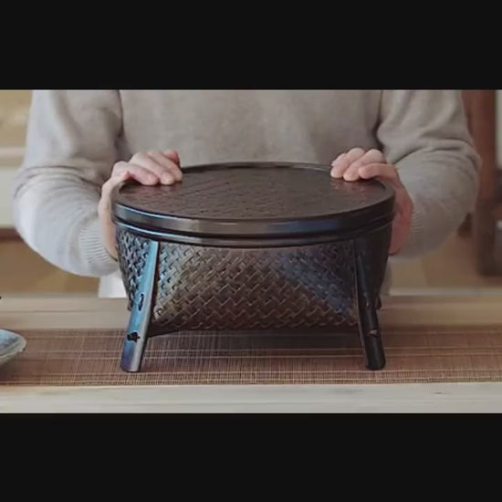 This is a bamboo weaving storage tea table