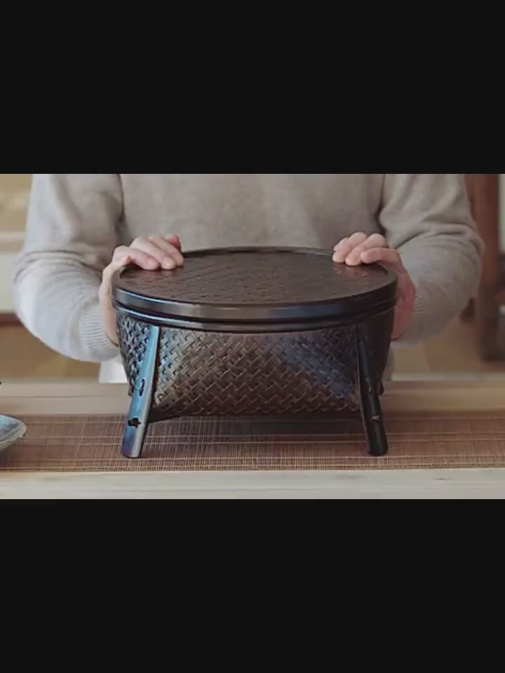 This is a bamboo weaving storage tea table