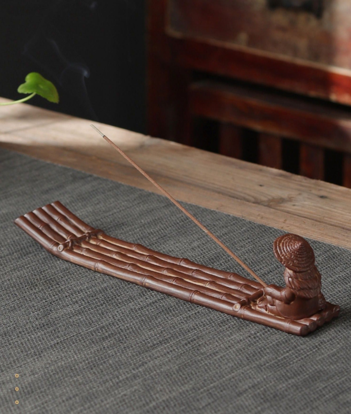 This is a ceramic incense holder