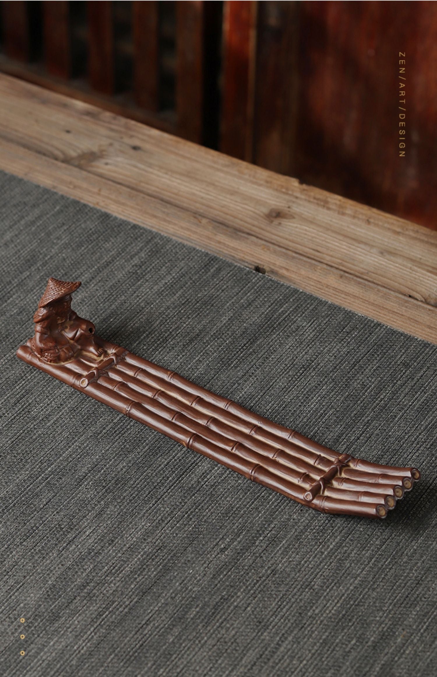 This is a ceramic incense holder