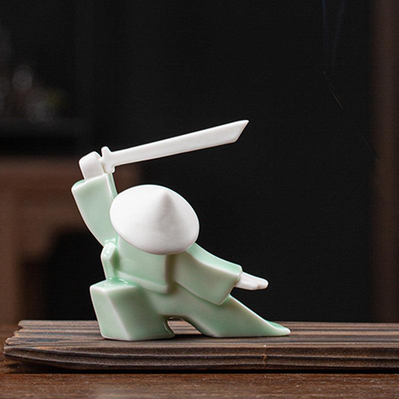 This is a ceramic incense holder tea pet