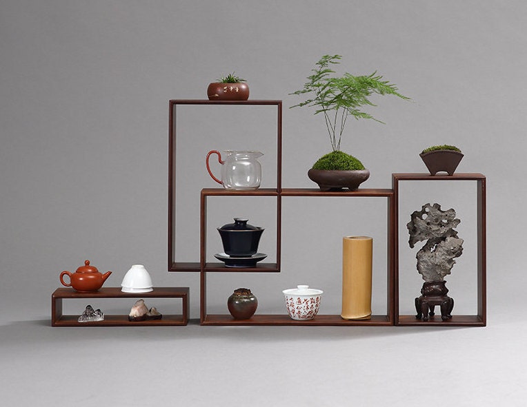 This is a bamboo combination shelf bamboo rack.this is a bamboo tea ware storage shelf 