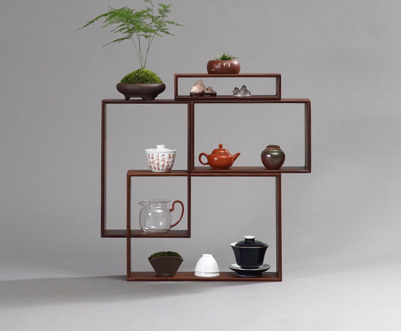 This is a bamboo combination shelf bamboo rack.this is a bamboo tea ware storage shelf 