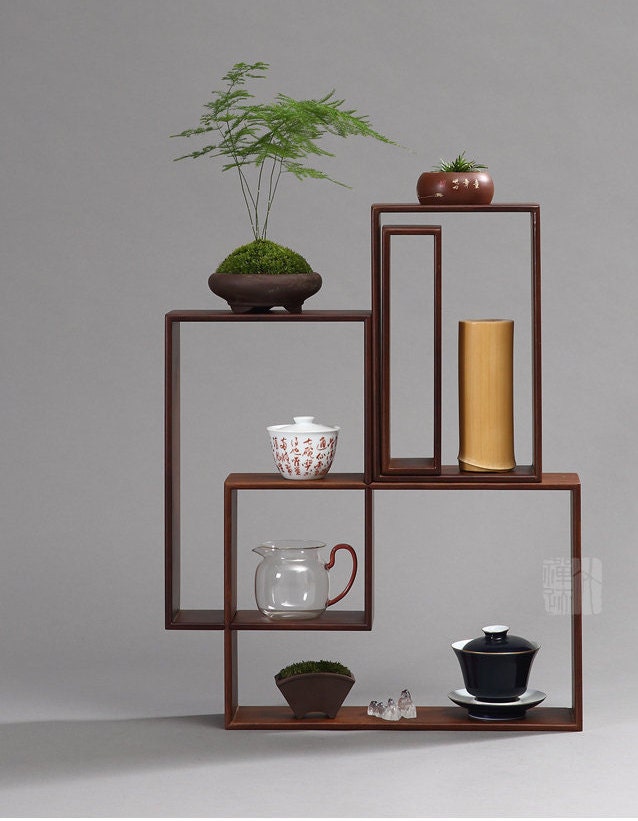 This is a bamboo combination shelf bamboo rack.this is a bamboo tea ware storage shelf 