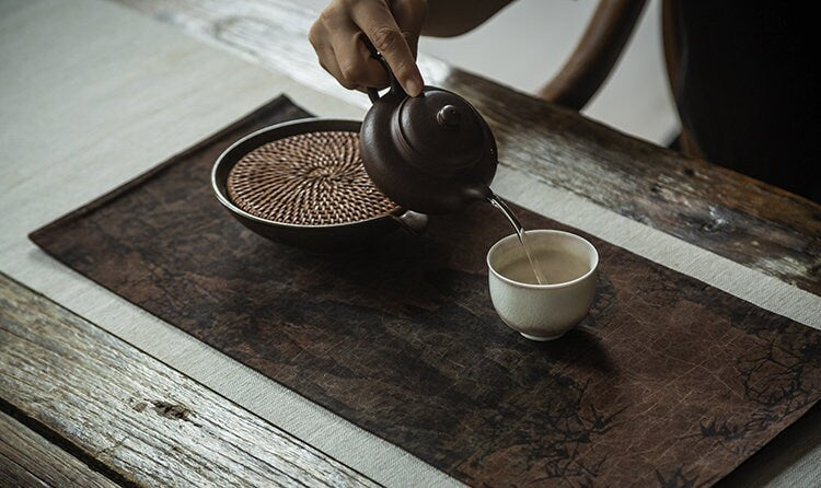 This is a gambiered canton silk xiangyunsha tea table cloth