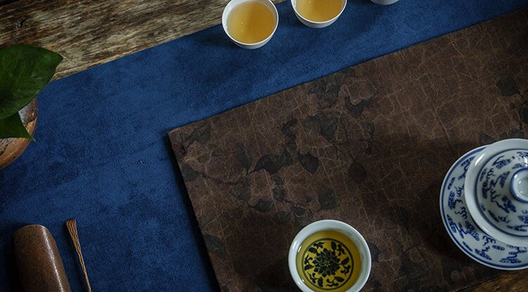 This is a gambiered canton silk xiangyunsha tea table cloth