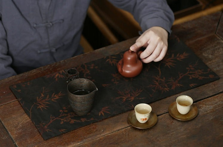 This is a gambiered canton silk xiangyunsha tea table cloth