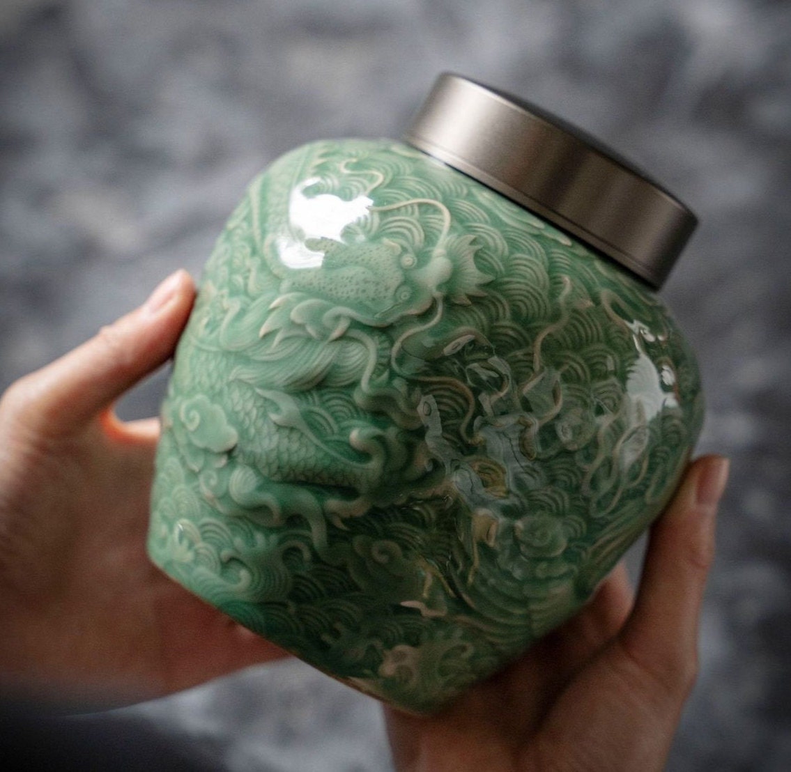 this is a celadon tea jar.this is a green ceramic tea storage canister