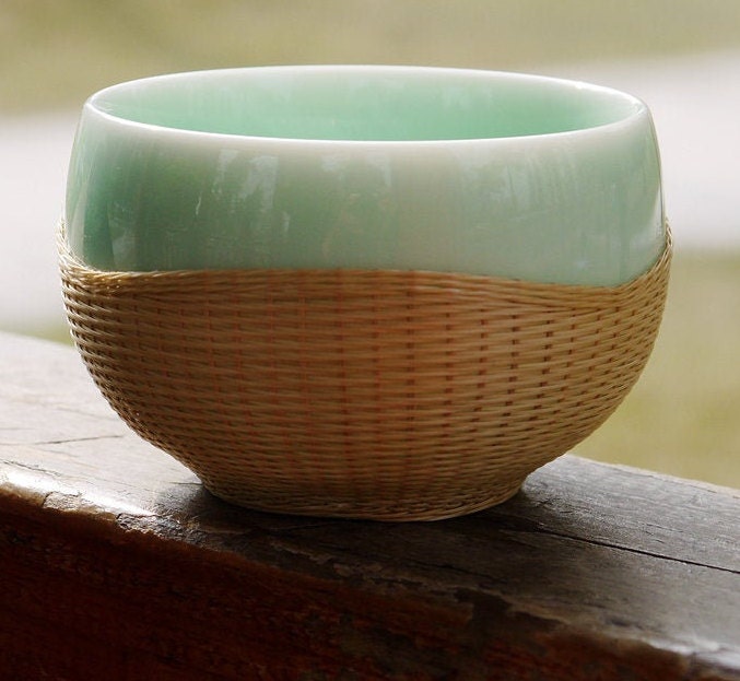 This is a bamboo woven teacup.this is a ceramic teacup