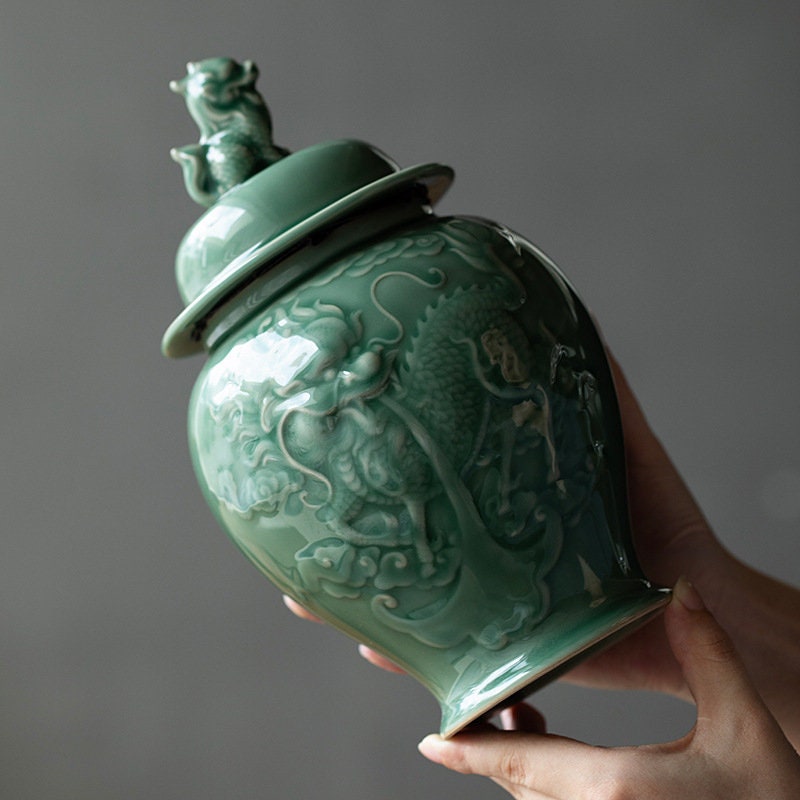 this is a celadon tea jar.this is a green ceramic tea storage canister