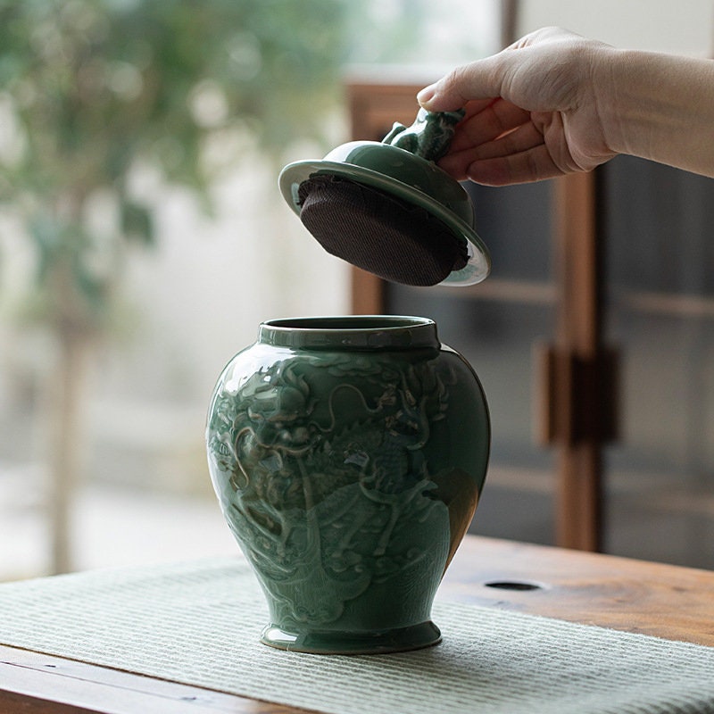 this is a celadon tea jar.this is a green ceramic tea storage canister