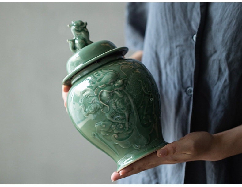 this is a celadon tea jar.this is a green ceramic tea storage canister