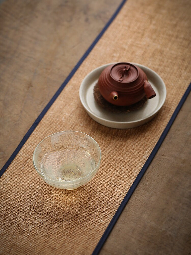 This is a raffia weaving mat table cloth