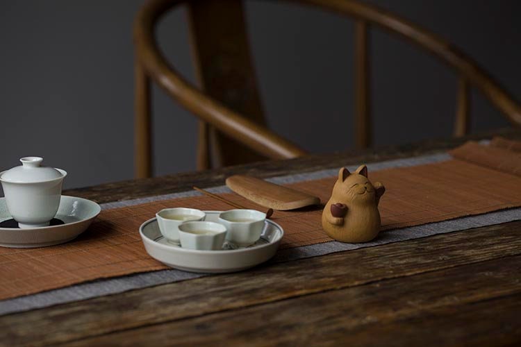 This is a Yixing purple clay Maneki-Neko teapet