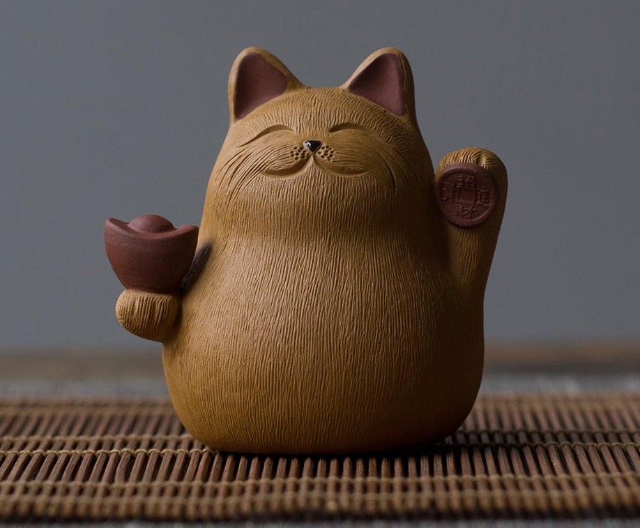 This is a Yixing purple clay Maneki-Neko teapet