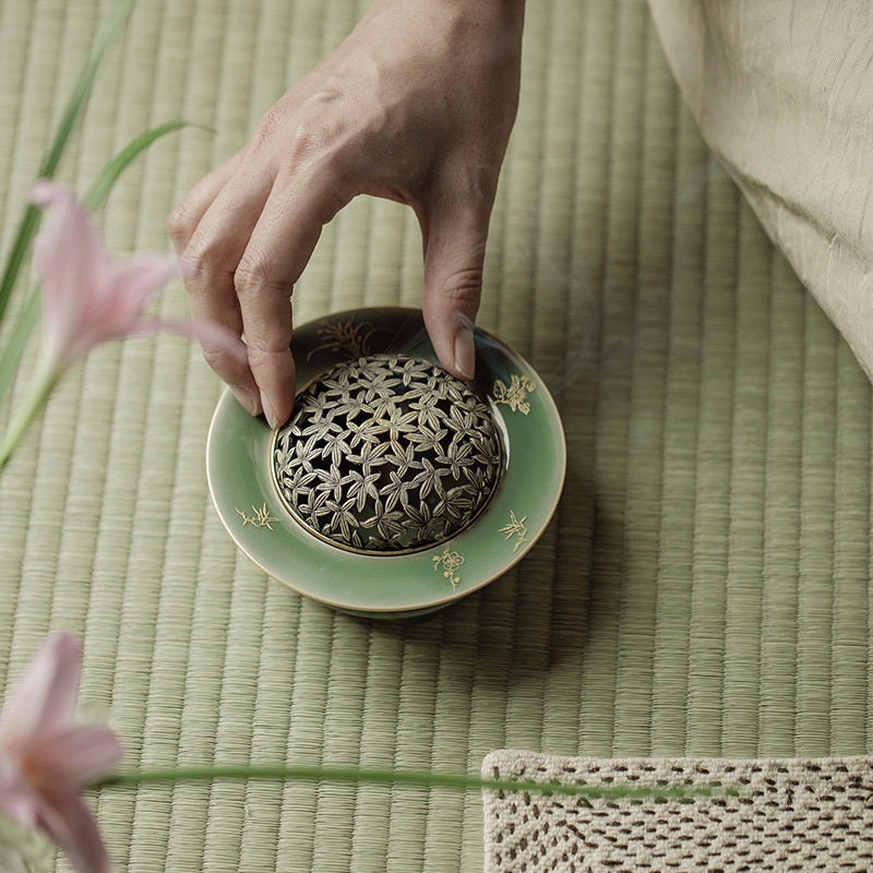 This is a Yue kiln celadon incense burner