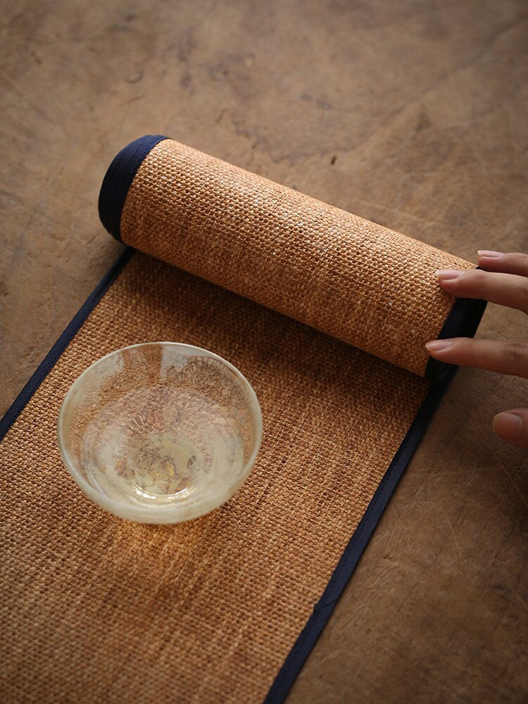 This is a raffia weaving mat table cloth