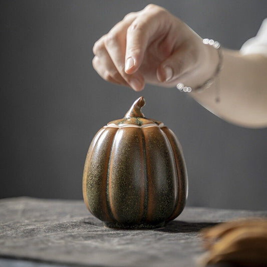 this is a ceramic tea storage canister tea jar