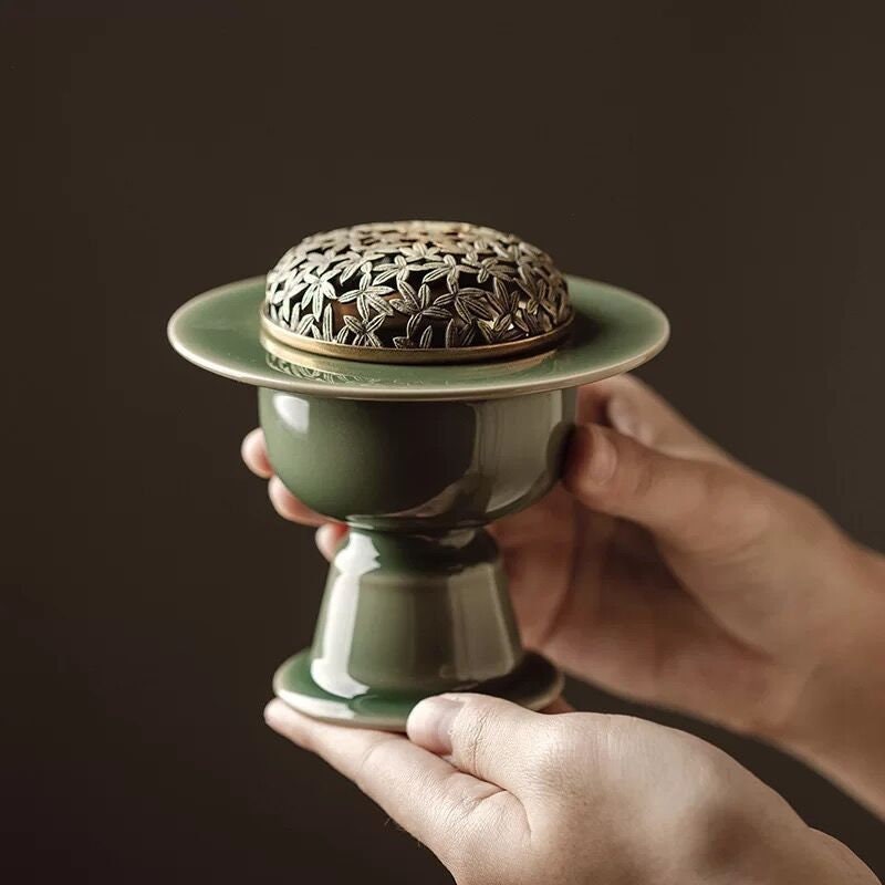 This is a Yue kiln celadon incense burner