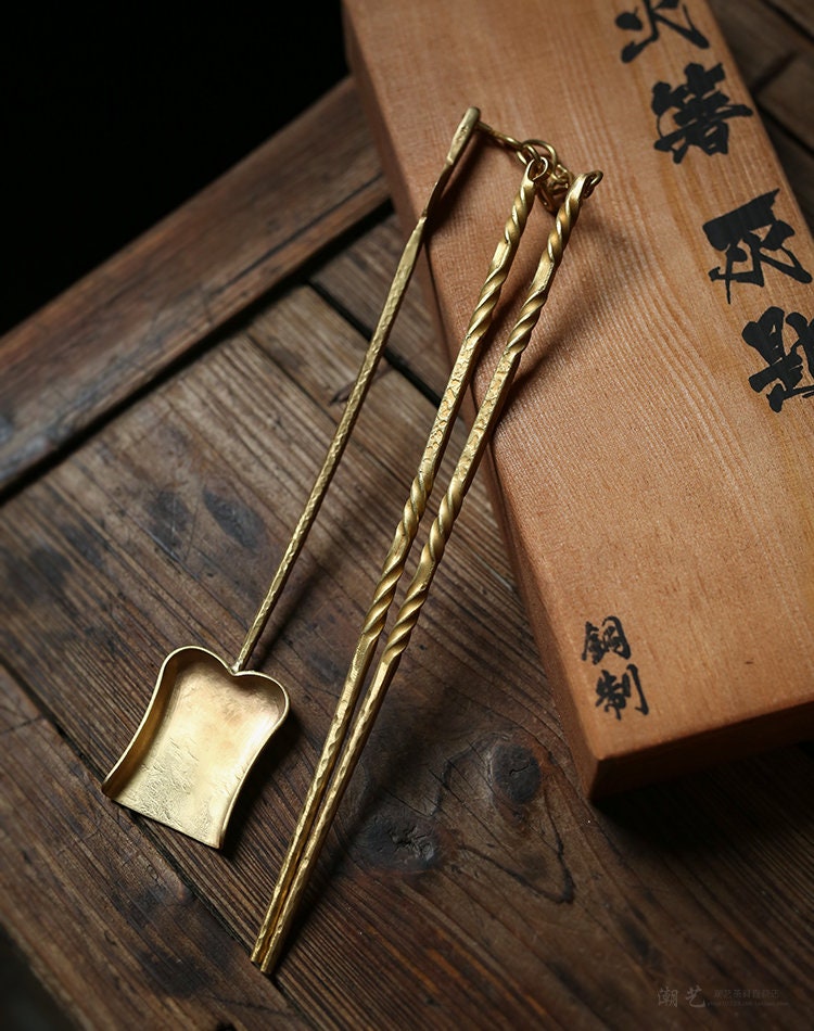 This is a brass copper chopsticks set