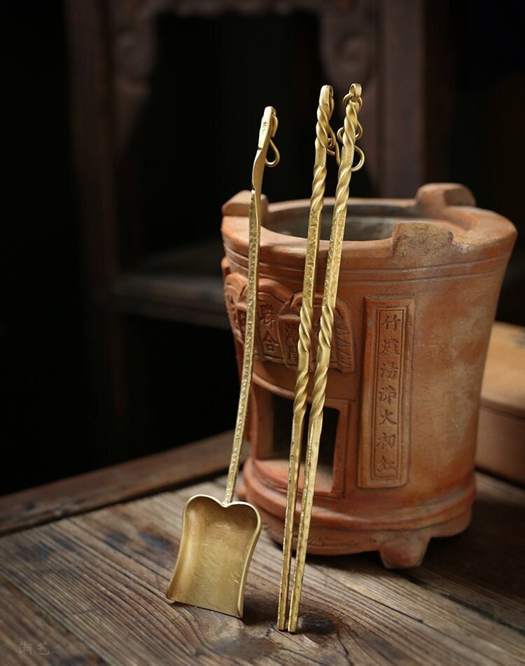 This is a brass copper chopsticks set