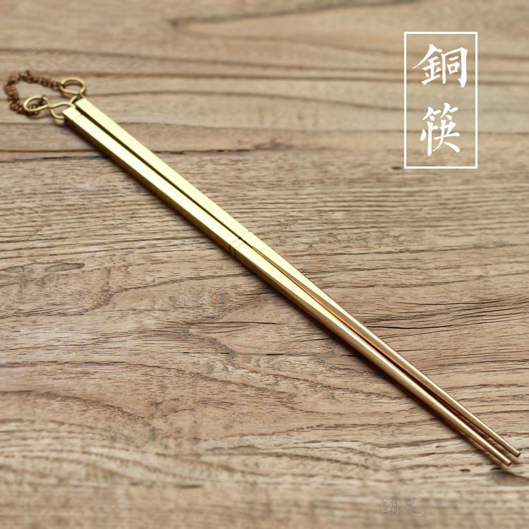 This is a brass copper chopsticks 