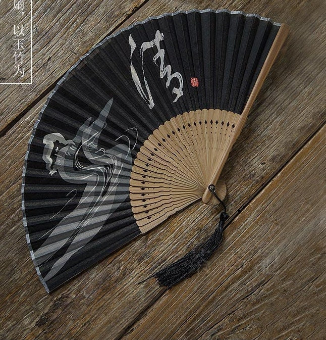 This is a bamboo cotton linen folding fan