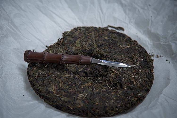 This is a bamboo puerh cake knife tea knife tea needles