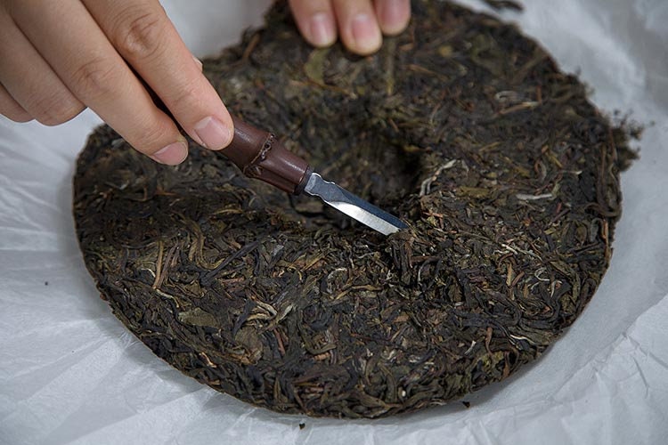 This is a bamboo puerh cake knife tea knife tea needles