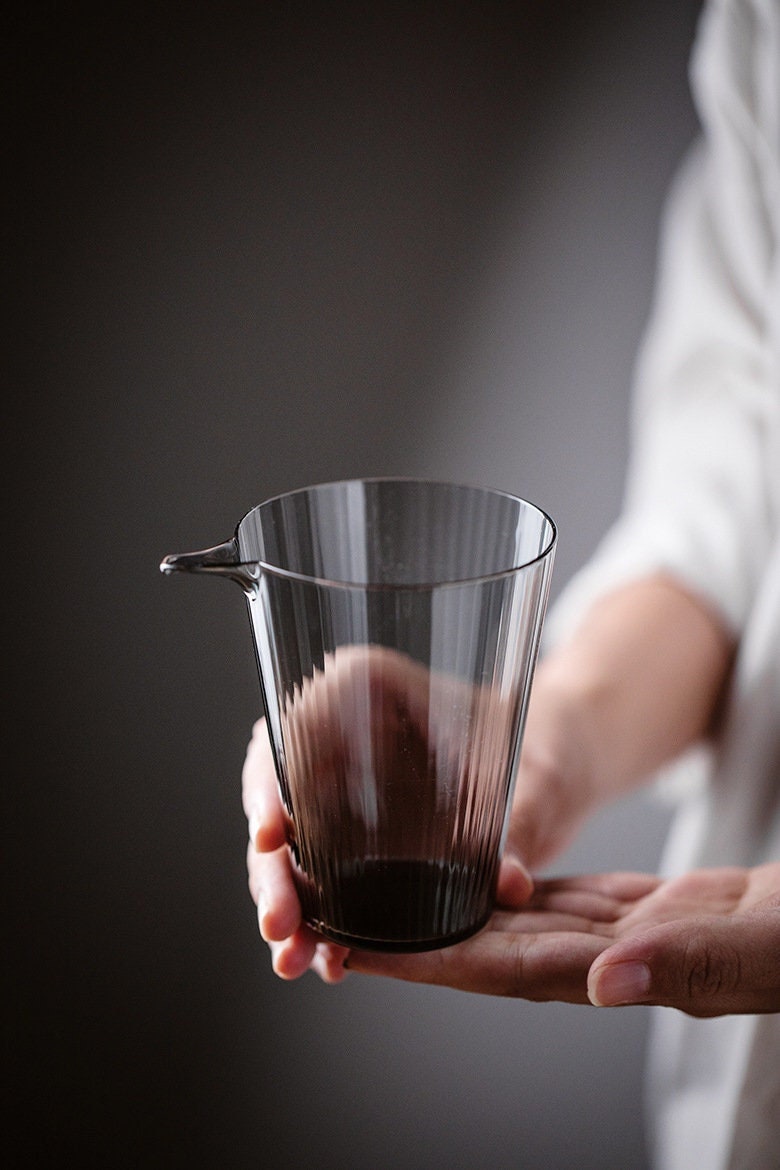 This is a transparent black glass faircup gongdaobei