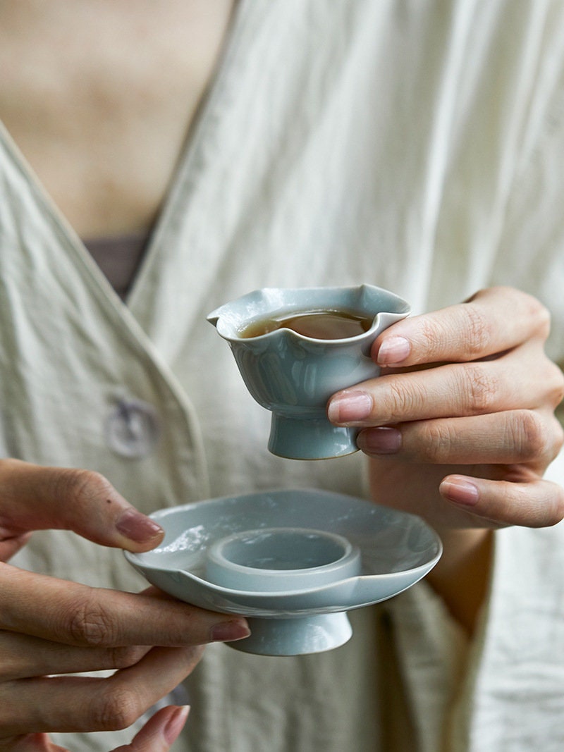 This is a ceramic high feet teacup