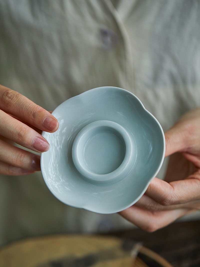 This is a ceramic high feet teacup