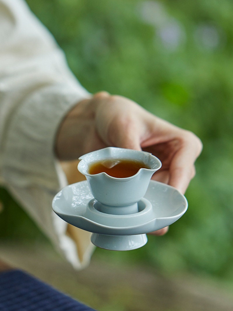 This is a ceramic high feet teacup