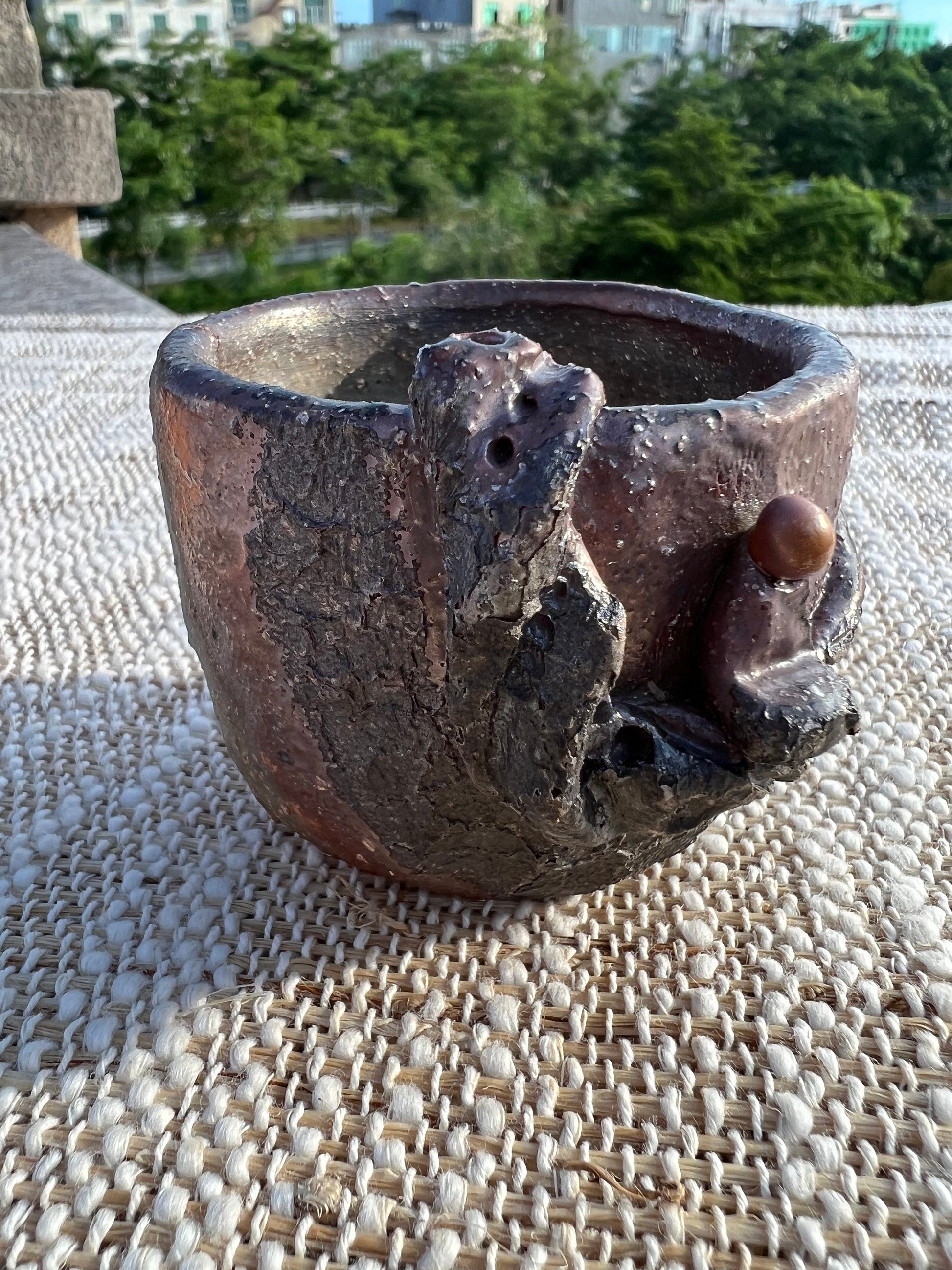 This is a woodfired pottery teacup