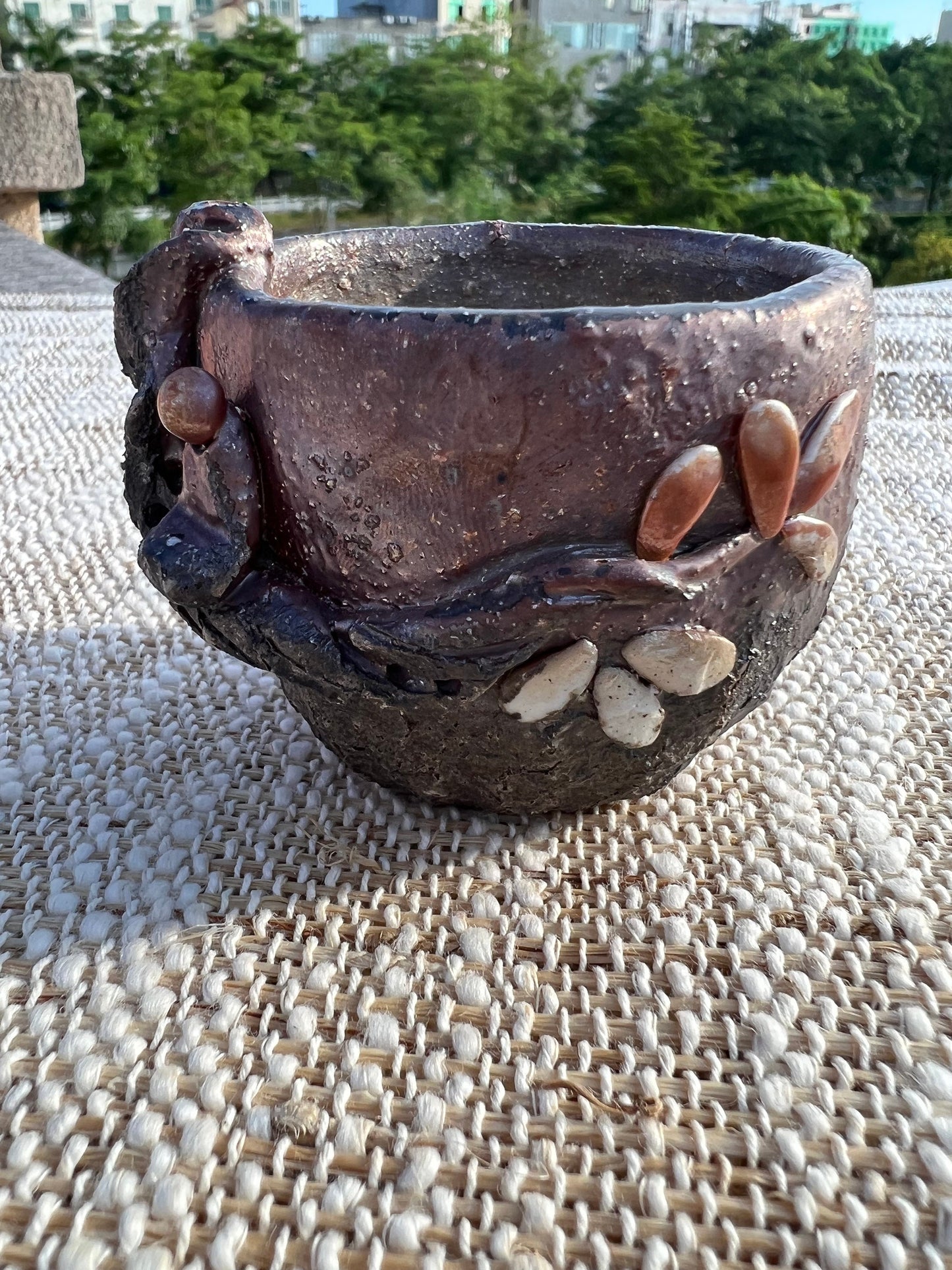 This is a woodfired pottery teacup