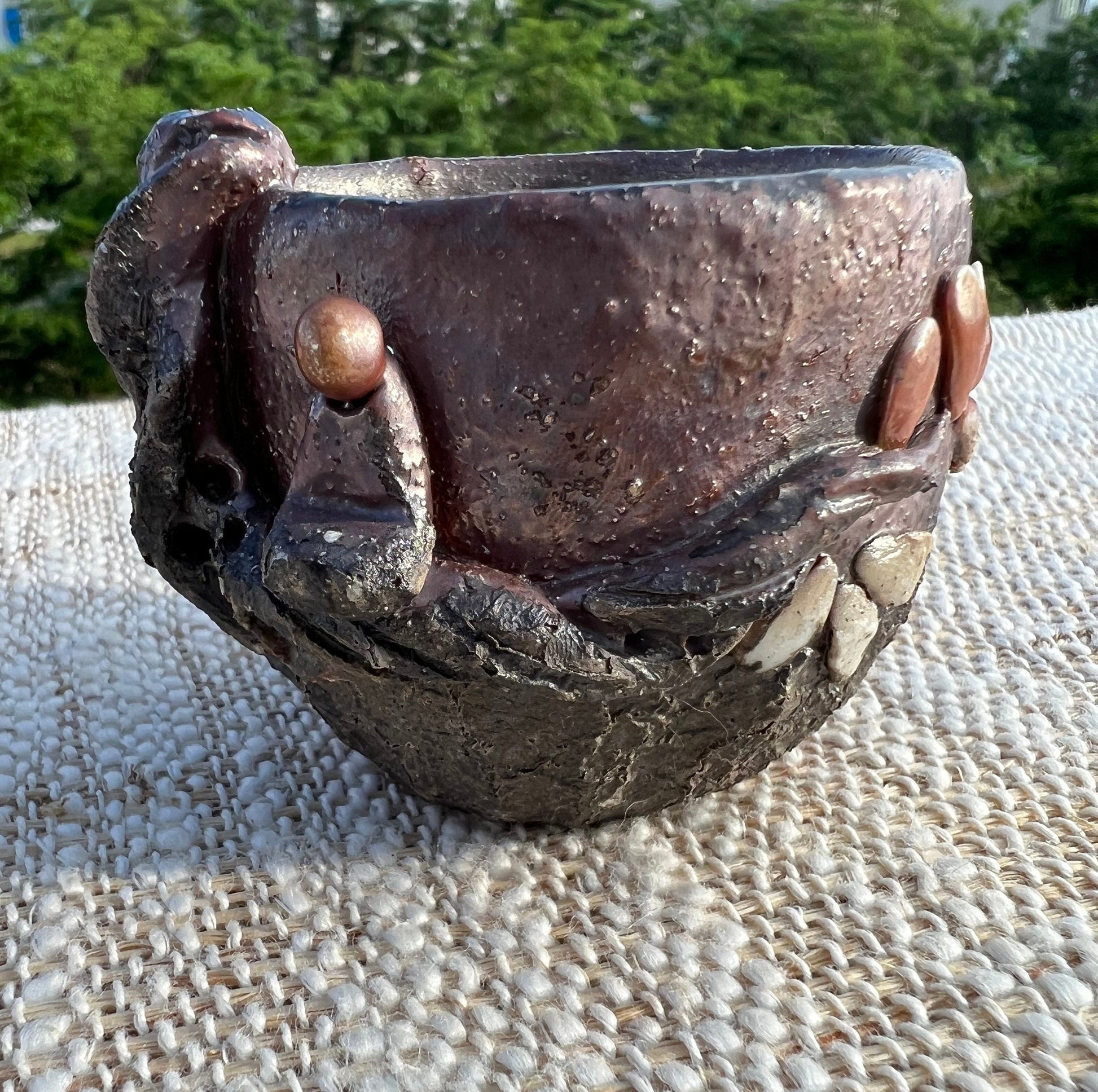 This is a woodfired pottery teacup