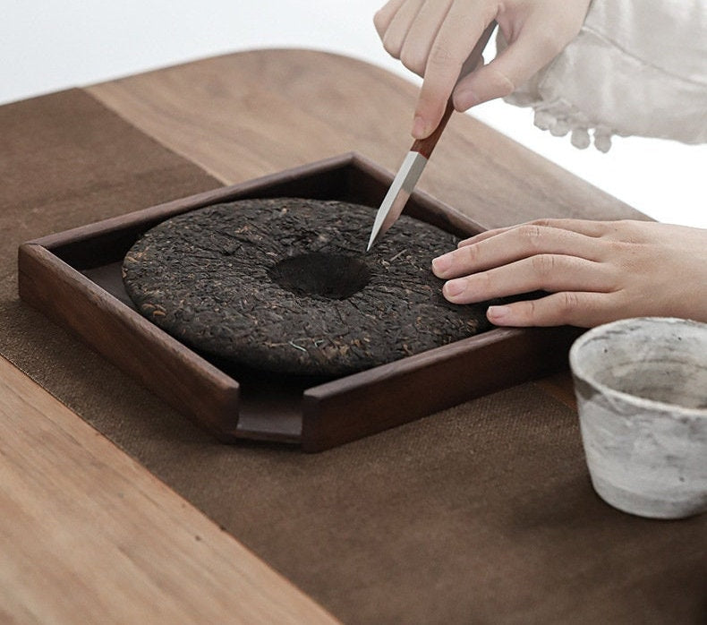 This is a walnut solid wood puerh tea tray tea shelf