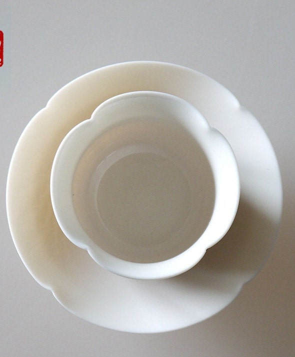 This is a bamboo woven teacup.this is a ceramic teacup