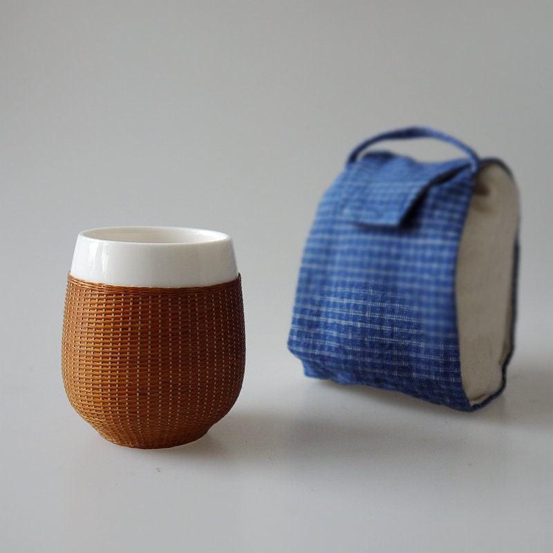 This is a bamboo woven teacup.this is a ceramic teacup